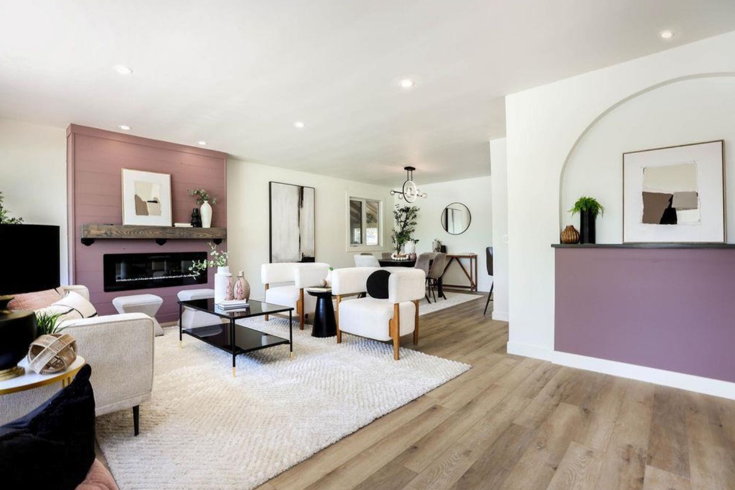 Bright open-plan living and dining room with wood flooring